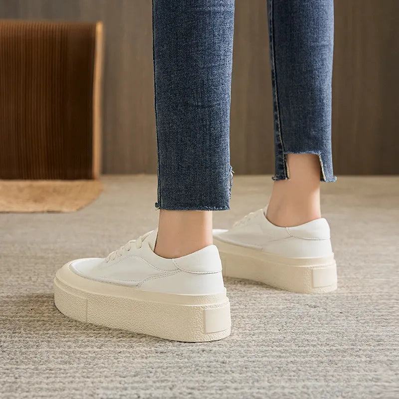 Women's black platform sports shoes with embossed cowhide upper and rubber sole