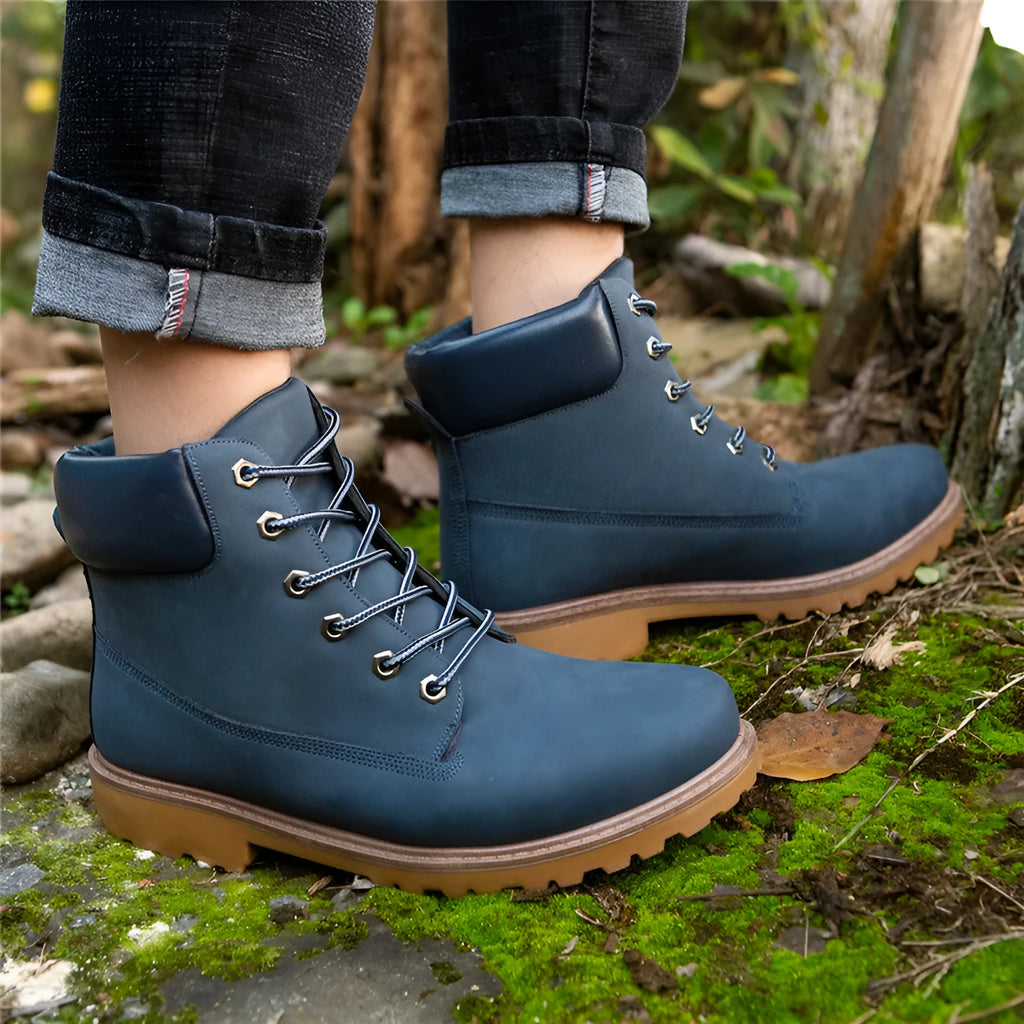 Pink men's Martin boots with velvet lining, round toe, and front lace-up closure on a flat bottom.