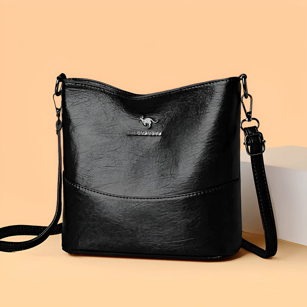 Women's soft leather shoulder bucket bag in black, wine red, or ginger yellow with mobile phone pocket