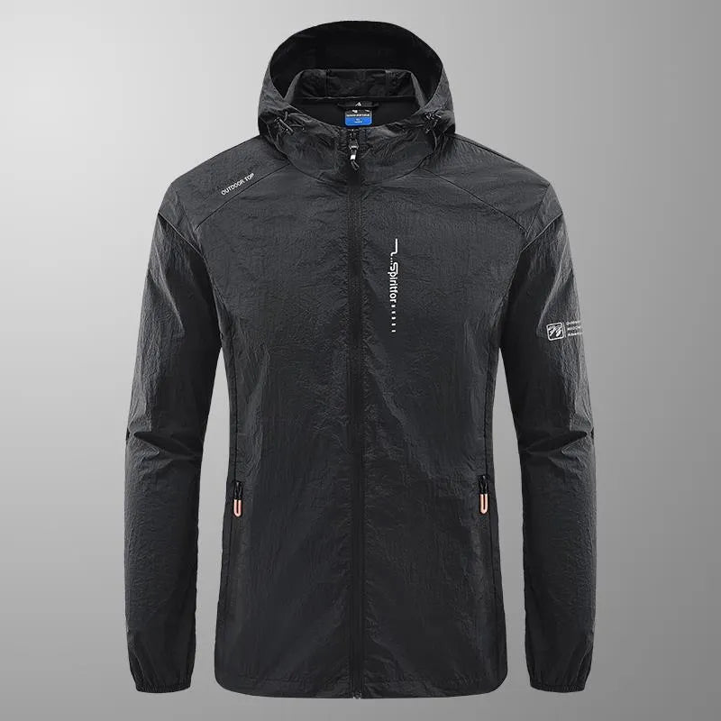Man wearing a lightweight grey hooded nylon summer jacket for sun protection.