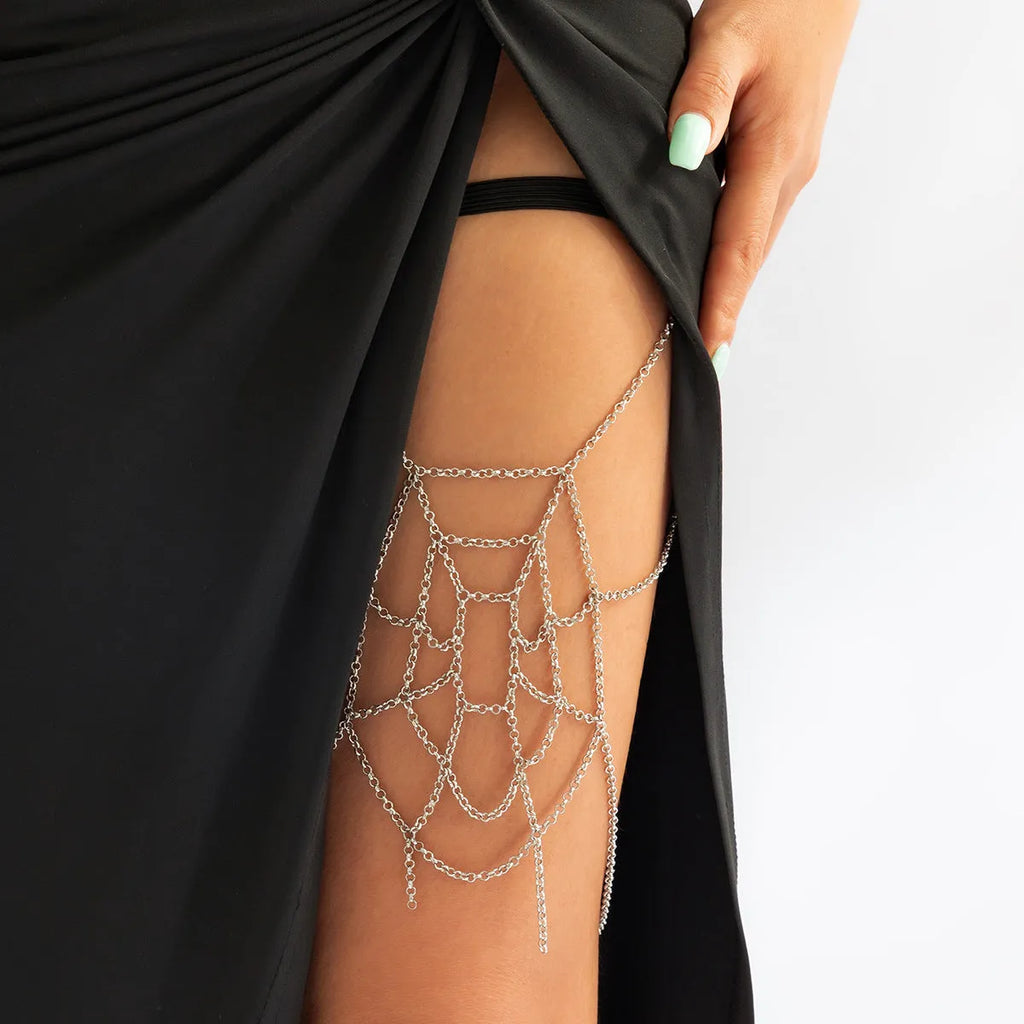 Women's simple geometric body chain in silver electroplated alloy, shown as an anklet
