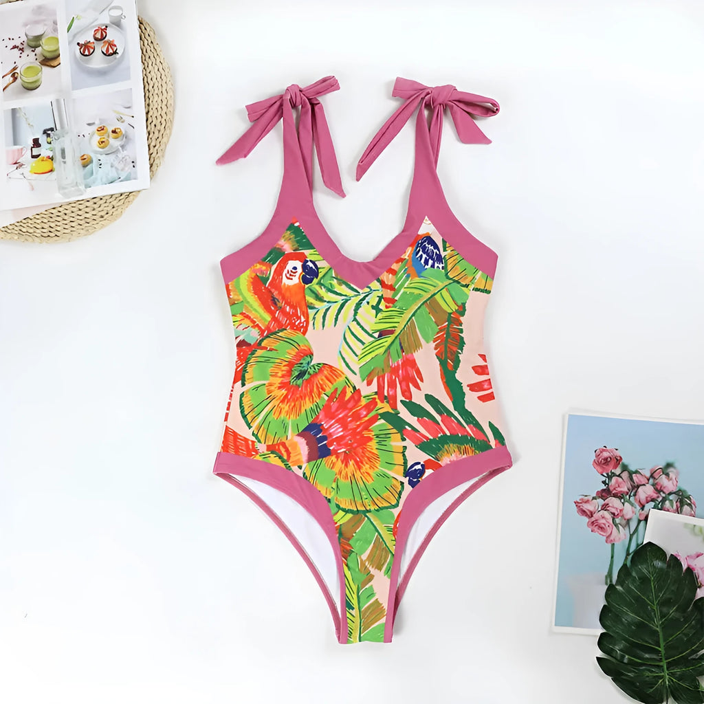 Women's pink floral print retro one-piece swimsuit with V-neck, covered belly and thin skirt