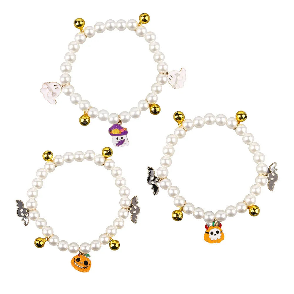 Halloween decorative pet collar with simulated pearl necklace and pumpkin designs in purple, black, and orange.