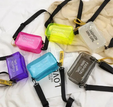 Transparent square jelly women's shoulder bag with an adjustable long strap, shown in multiple colours.