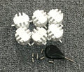 Set of six PVC surfboard G5 tail rudders in round cup design, black colour, on a flat surface