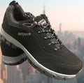 Men's army green low-top outdoor hiking shoes with viscose sole on a neutral background.
