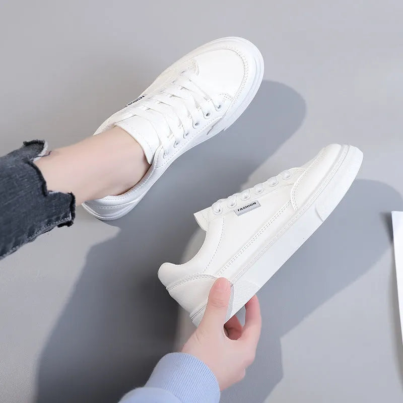 Korean style low-top sneakers in brown and white colours with artificial PU leather uppers
