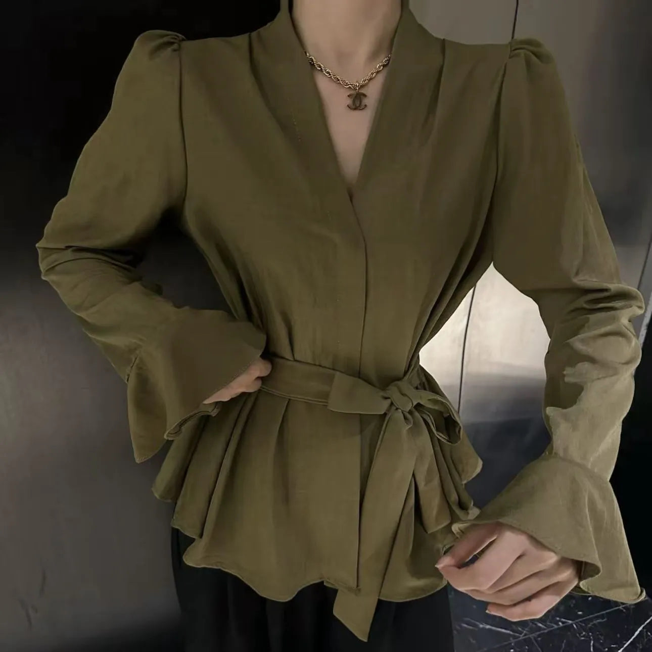 Women's French-style shirt with irregular collar and tied front in polyester fabric with bell sleeves