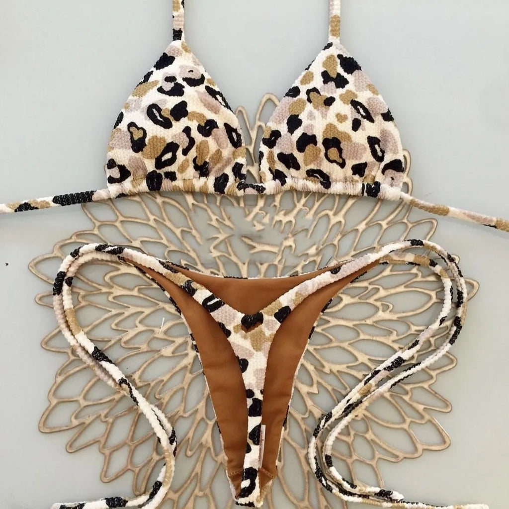 Women's printed bikini swimsuit with cotton lining on mannequin showing briefs style