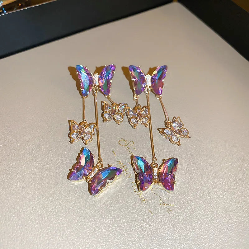 Blue purple butterfly tassel drop earrings with silver needle crystal flowers on electroplated alloy