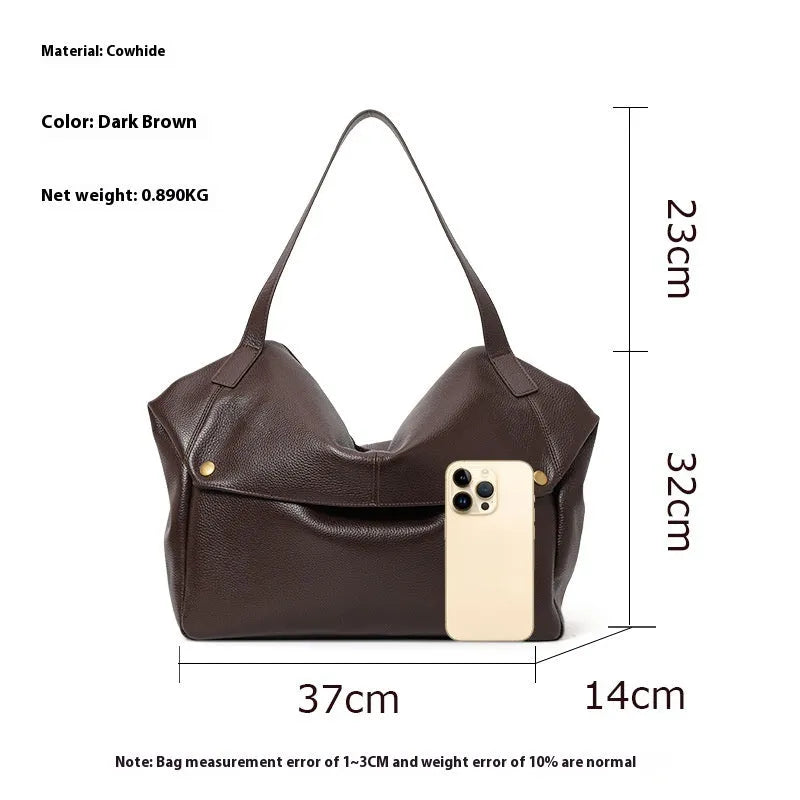 Brown genuine leather women's shoulder bag with horizontal square shape showing interior zipper compartment