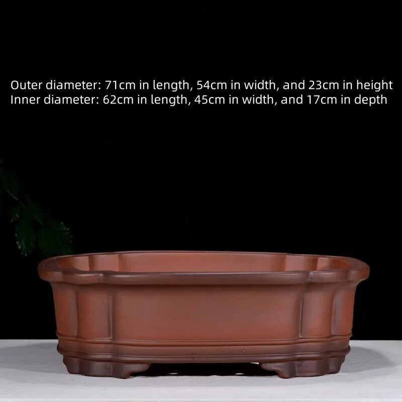 Large rectangular purple clay flowerpot with antique jade finish and Chinese crabapple carvings