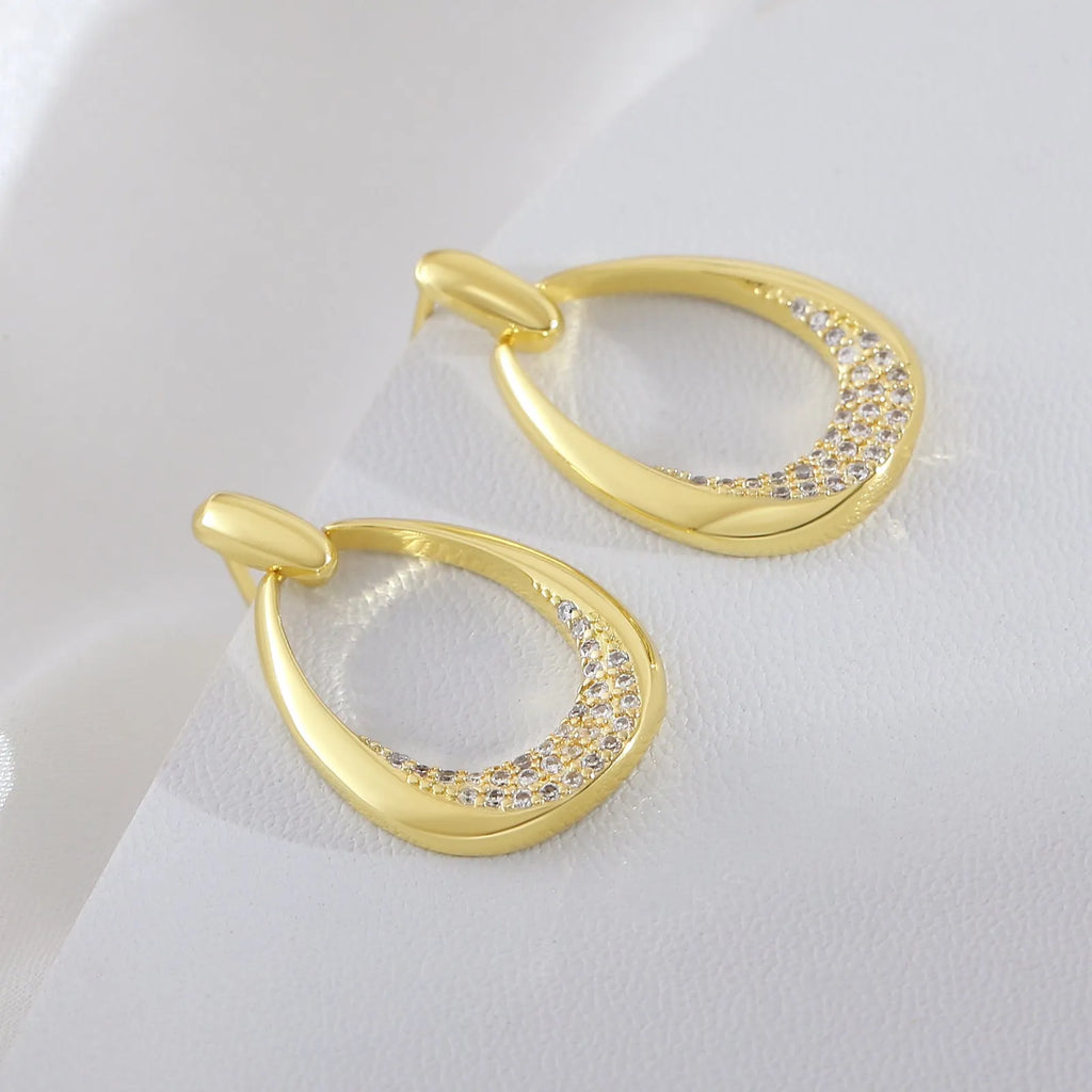 Women's yellow gold geometric drop-shaped ring earrings with copper construction and electroplated finish