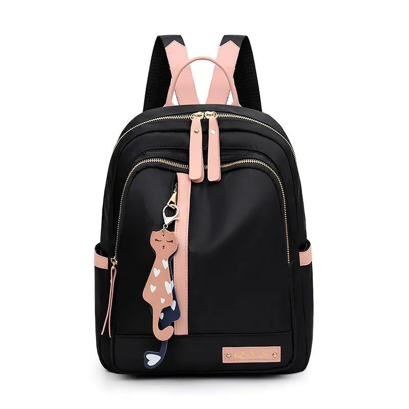 Women's soft nylon casual backpack in black colour with double shoulder straps and external pockets