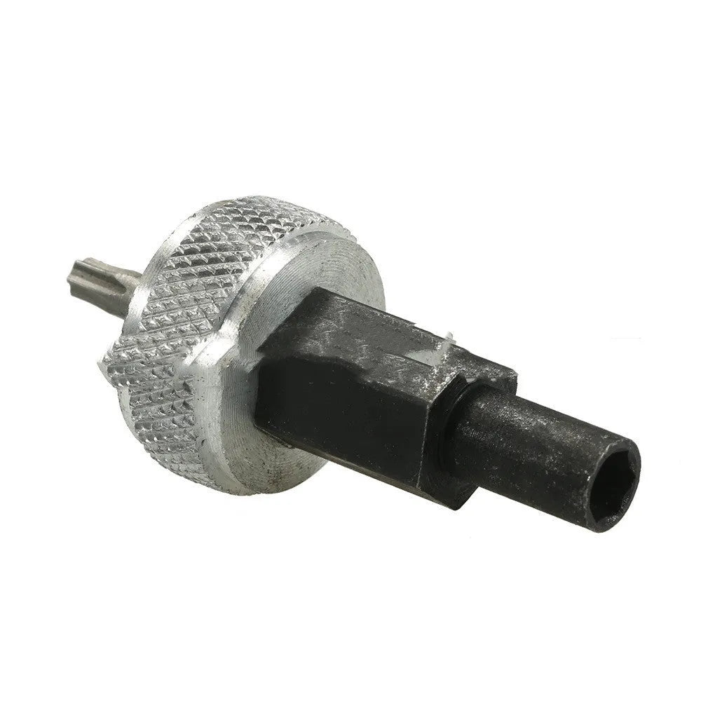 Close-up of a carbon steel ignition module wrench with knurled aluminium knobs, shown with a 7/32" hex bolt.