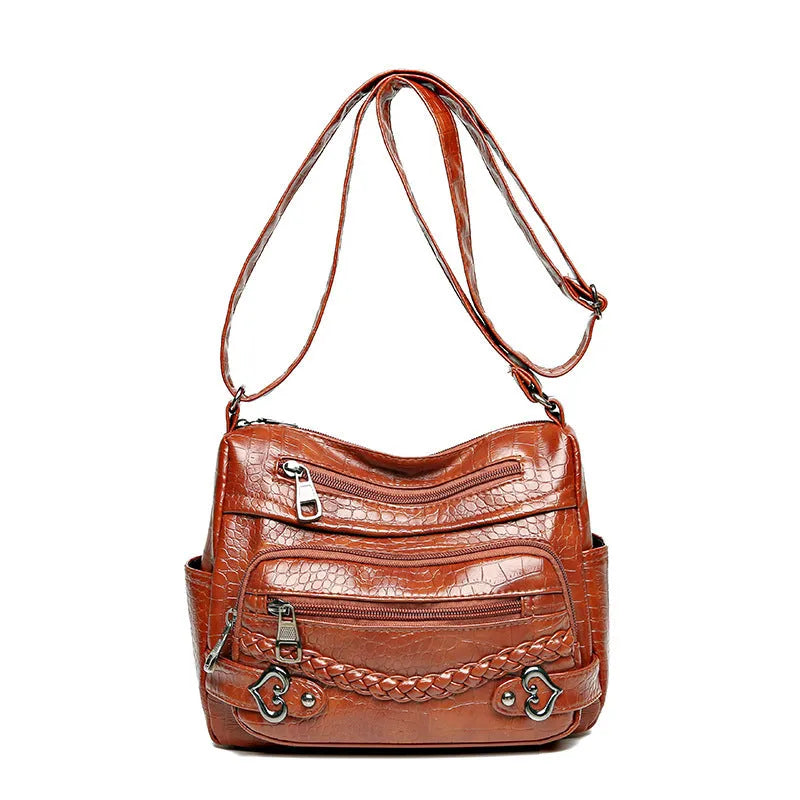 Large capacity knitted messenger bag in brown with PU leather trim, zip closure, and outer pocket, 23x11x17cm