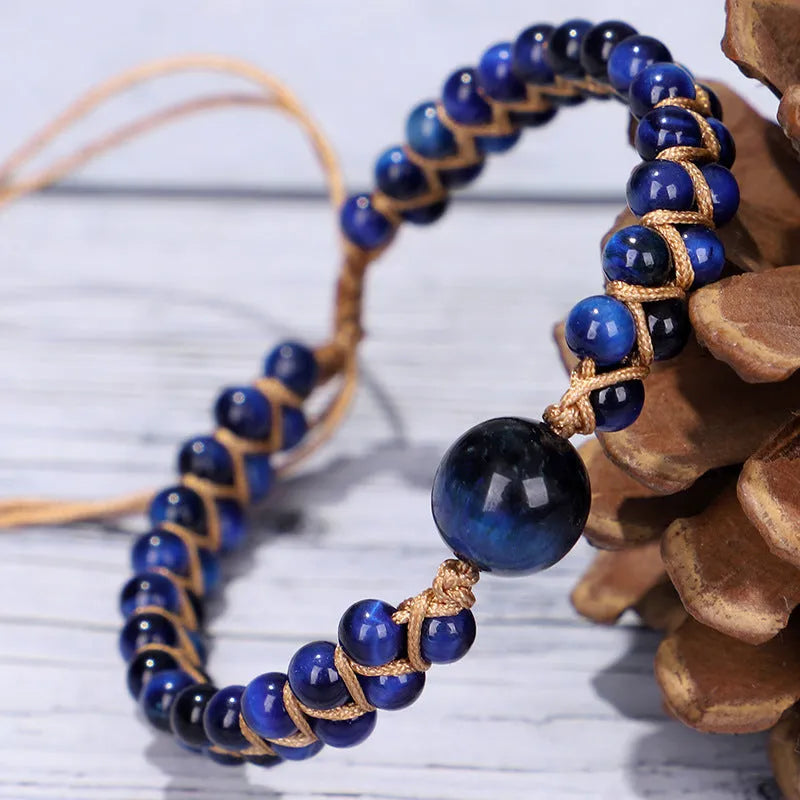 Handmade woven pull bracelet with geometric tigereye beads in blue or amethyst colour