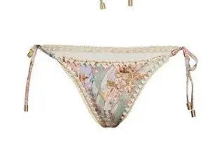 Women's creamy-white floral bikini suit with top, underwear, and matching skirt