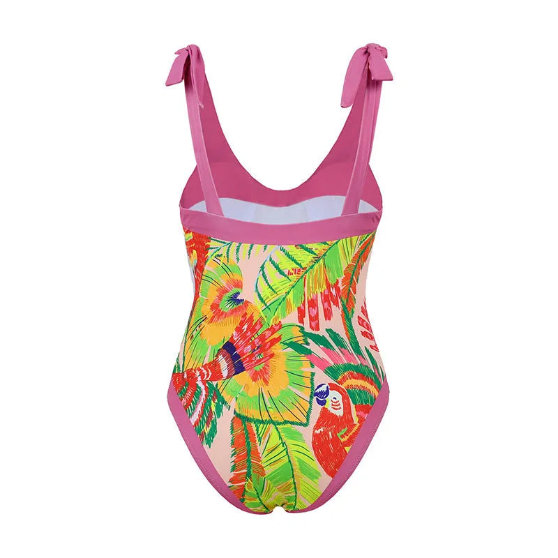 Women's pink floral print retro one-piece swimsuit with V-neck, covered belly and thin skirt