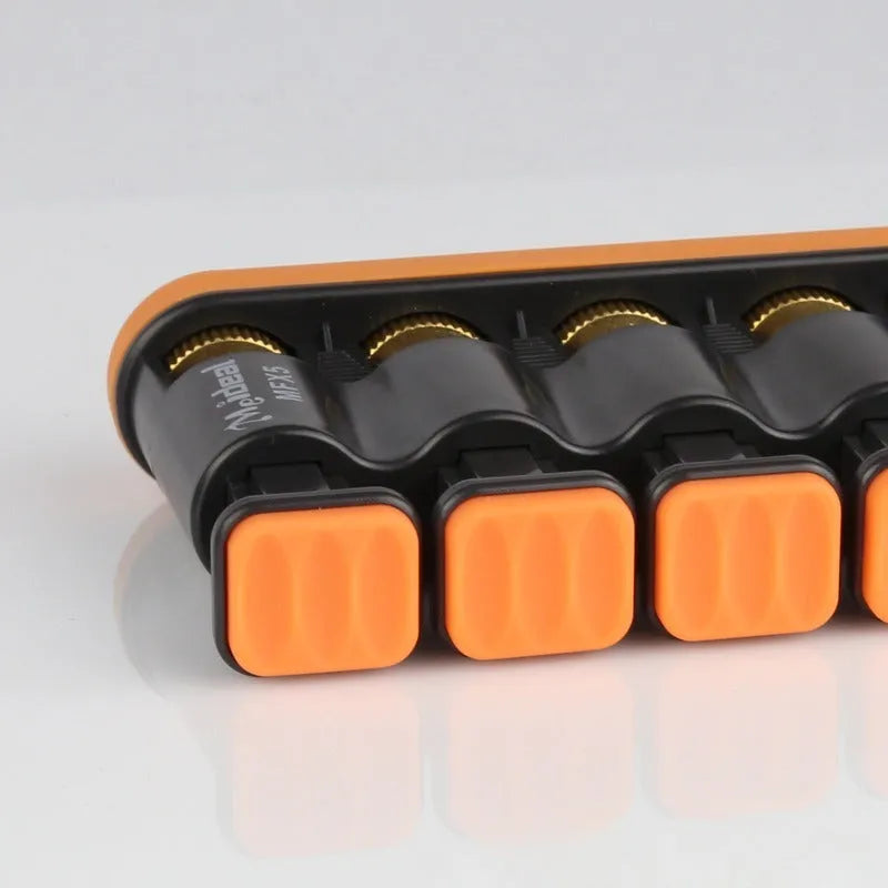 Grey and orange silicone finger strength trainer for musicians and climbers.