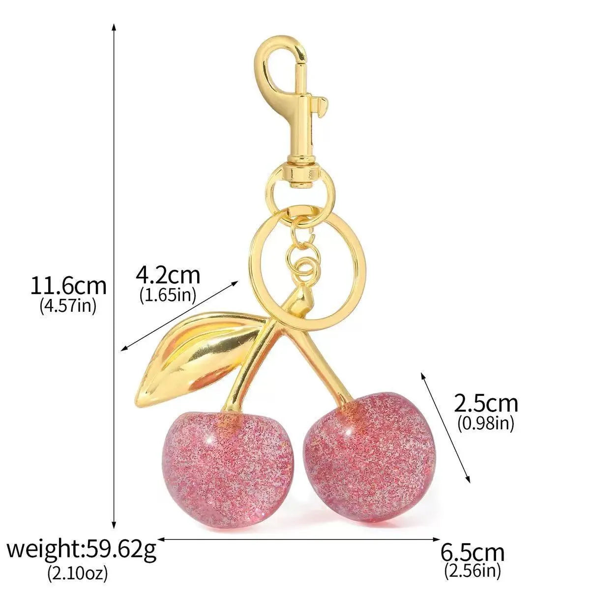 Three-dimensional cherry-shaped zinc alloy key ring pendant in pink or red colour.