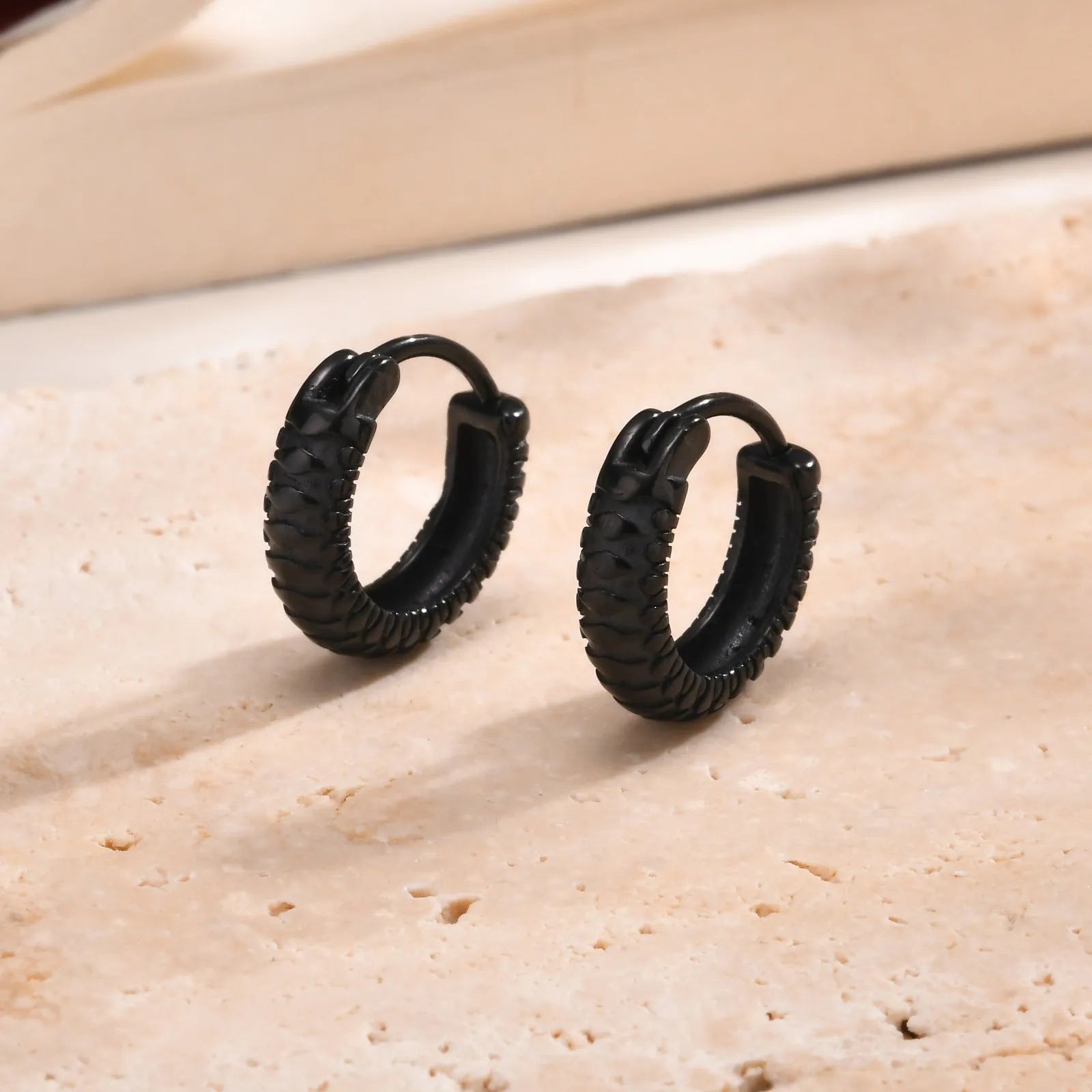 Stainless steel snake pattern hip hop ear rings in black and gold minimalist design