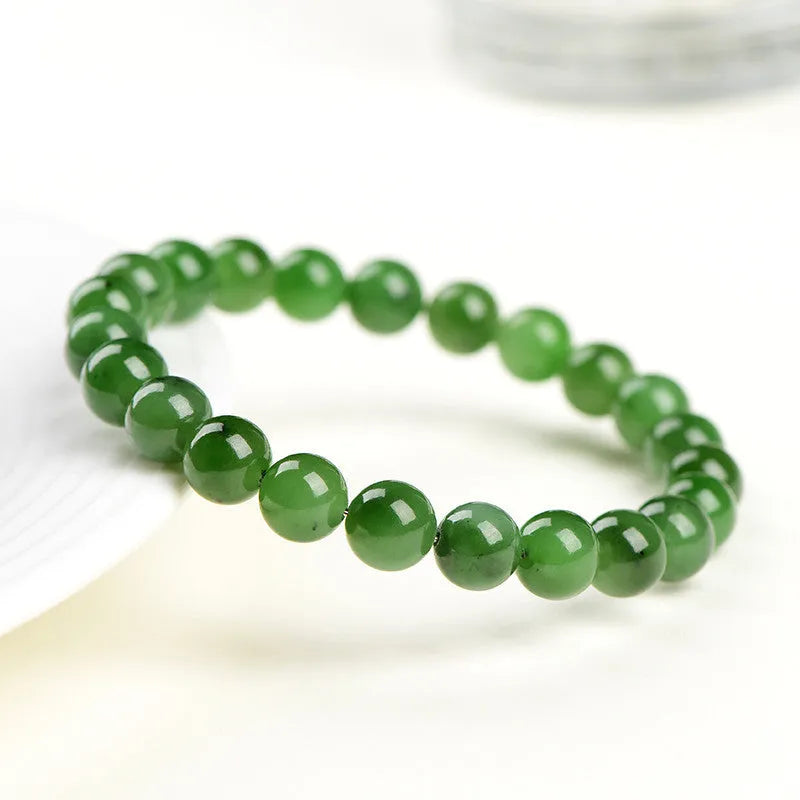 Natural jasper ball bracelet showing polished Hetian jade and jasper stone beads in one of five available sizes from 4mm to 12.8mm.