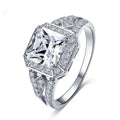 Women's geometric zircon ring with hollow design and quadrilateral shape in platinum colour.