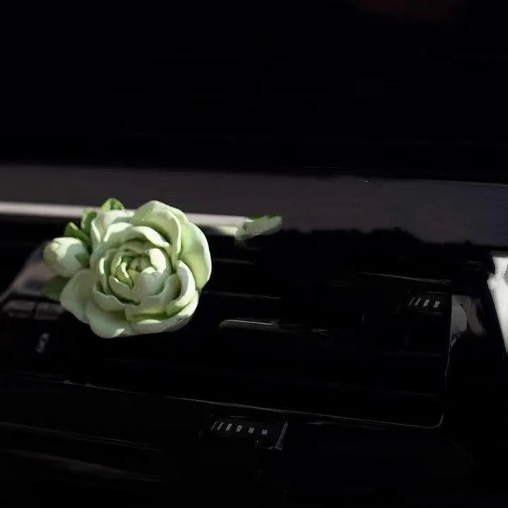 Jasmine scent solid gypsum car air vent clip diffuser measuring 5 by 4.5 centimetres.
