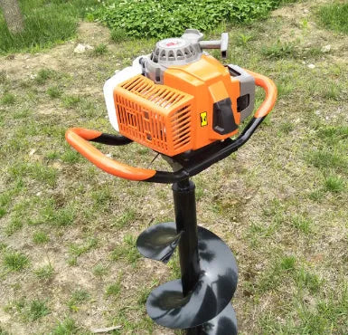 Portable single-person gasoline hole digger for fruit tree fertilization, shown with engine and digging attachment