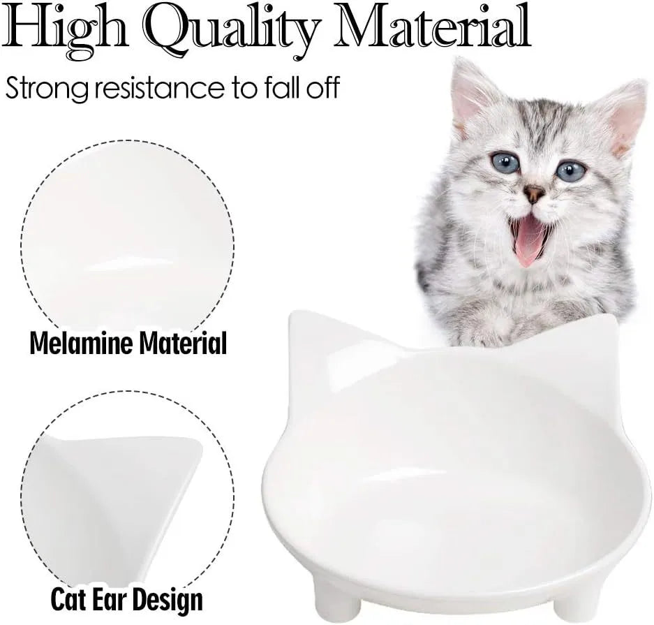 Shallow black melamine cat bowl with non-slip rubber base on a kitchen floor