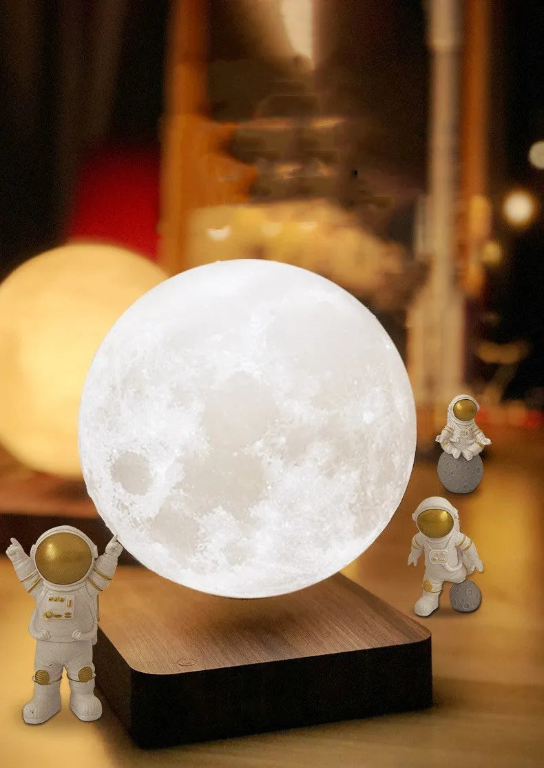 Maglev floating moon night light with LED illumination and astronaut figurines