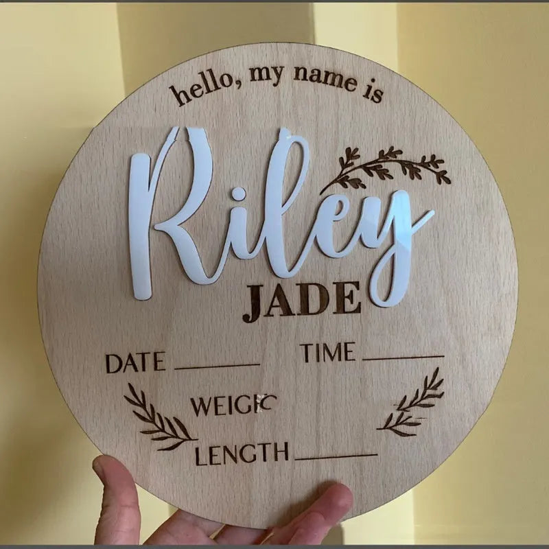 Square wooden baby name plaque with birth details, 15cm by 15cm, in three style options.