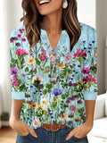 Women's loose fit V-neck t-shirt with a colourful 3D effect printed pattern on the front.