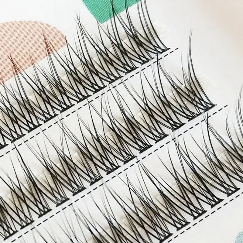 Black V-shaped fairy fishtail false eyelashes with thick segment design shown at 10mm length