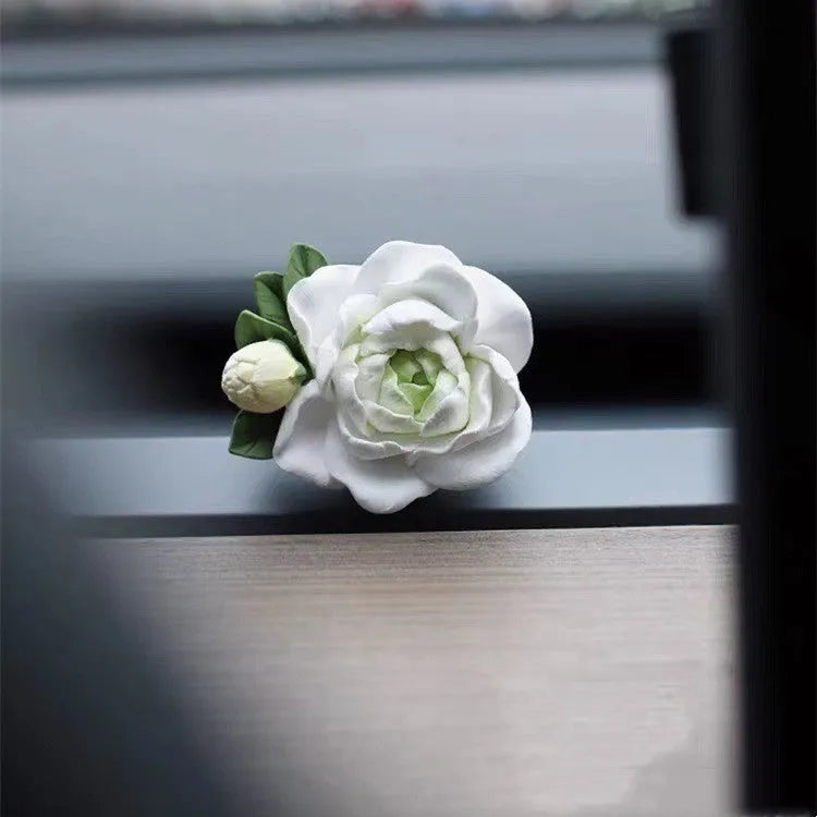 Jasmine scent solid gypsum car air vent clip diffuser measuring 5 by 4.5 centimetres.