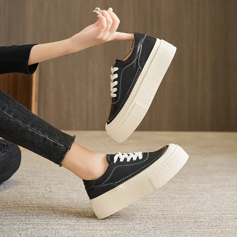 Women's black platform sports shoes with embossed cowhide upper and rubber sole