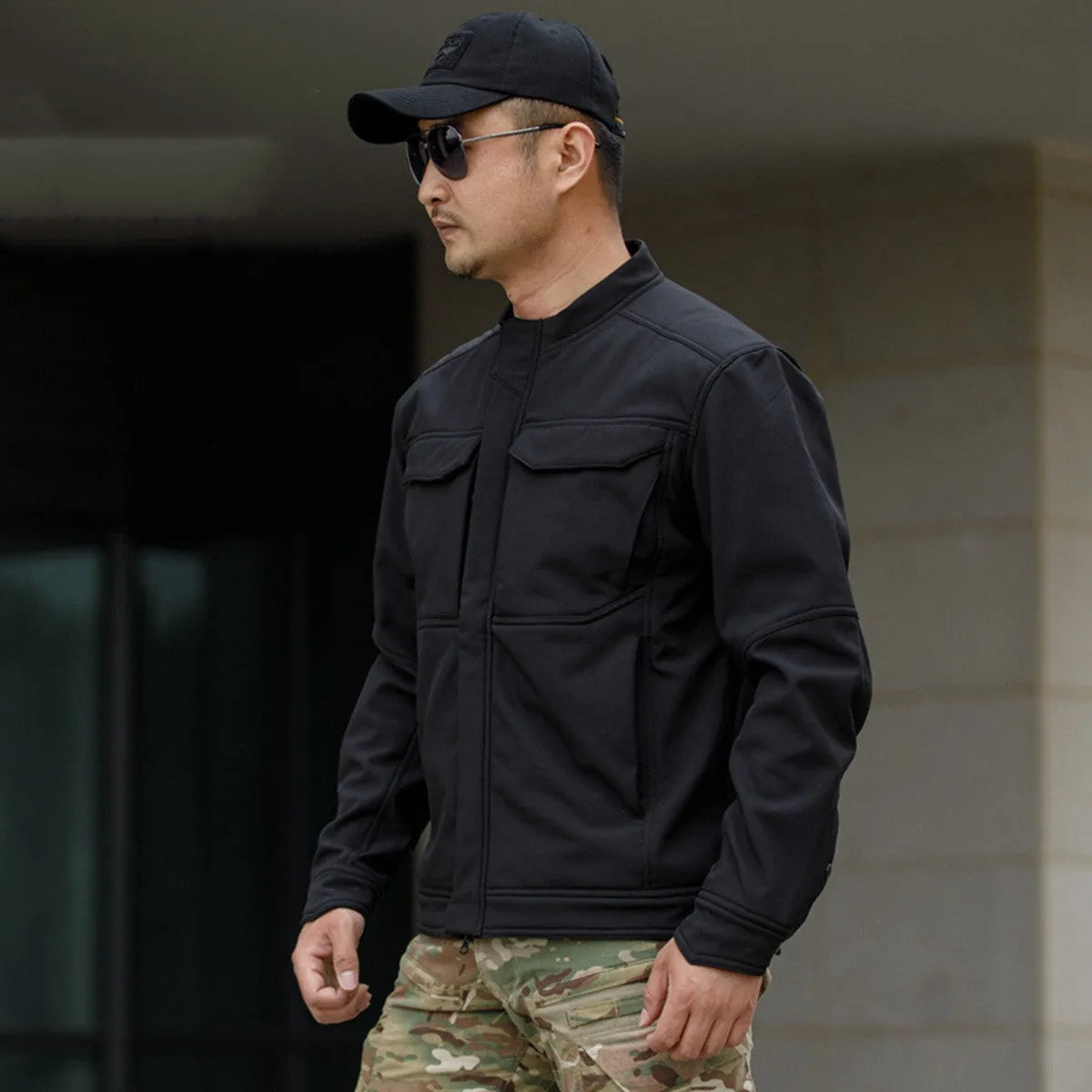 Bone Frog Peak Breaker soft shell tactical jacket in black camouflage colour for outdoor mountaineering.