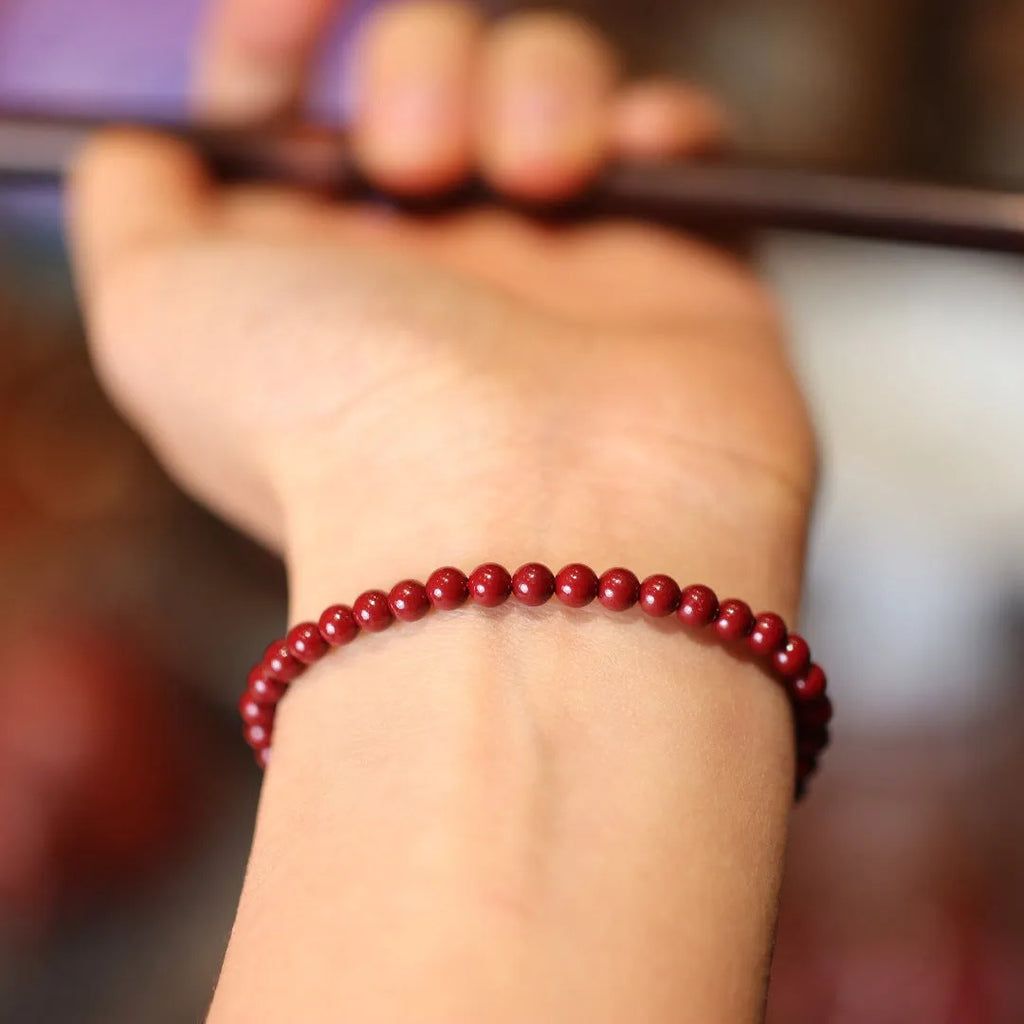Purple gold sand design cinnabar bracelet with geometric shapes and auspicious patterns