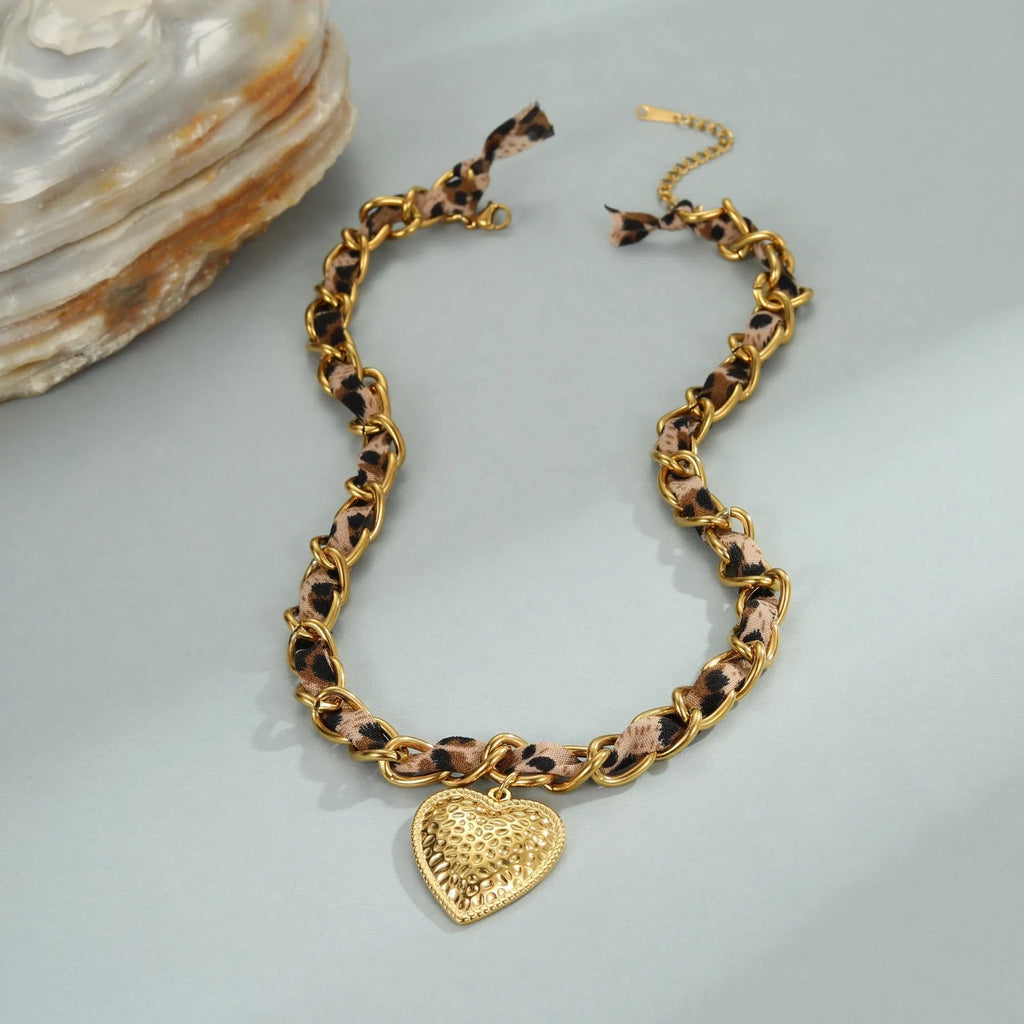 Geometric leopard love pendant necklace on stainless steel chain with 18K electroplated finish