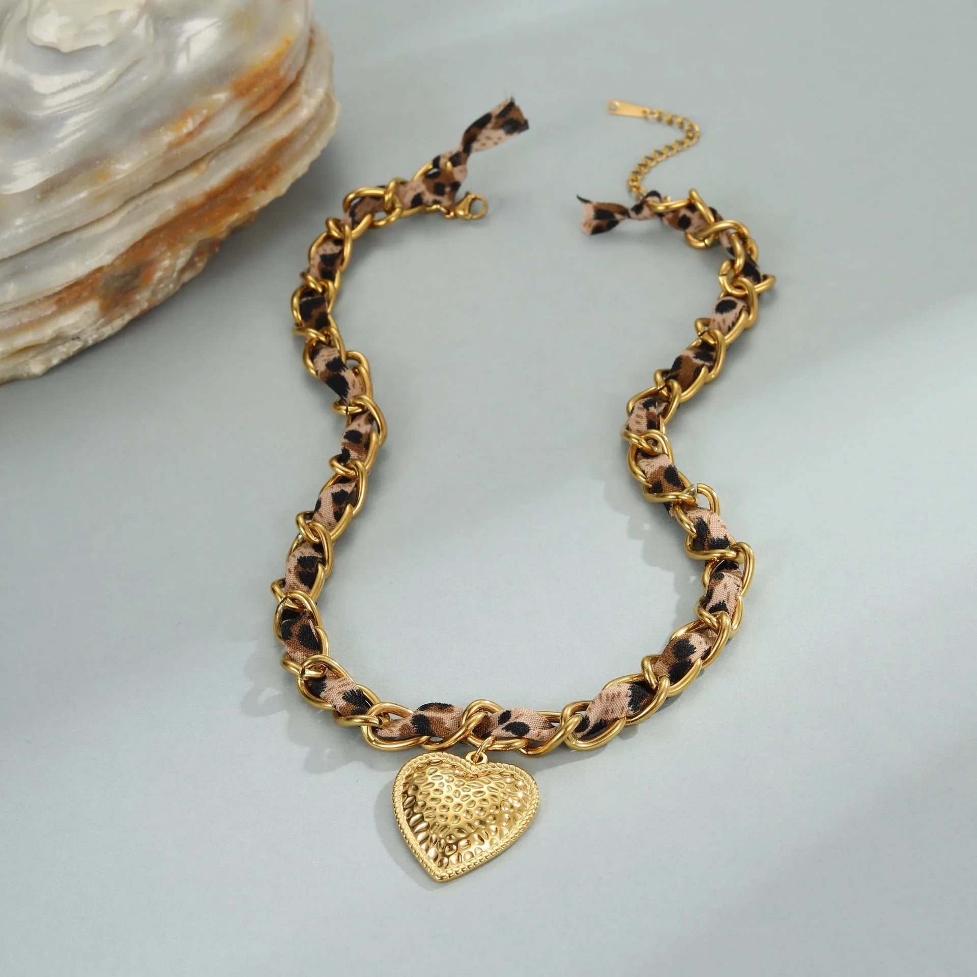 Geometric leopard love pendant necklace on stainless steel chain with 18K electroplated finish