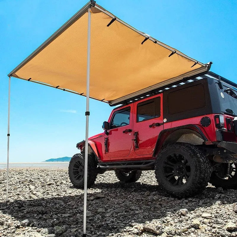 Camouflage two-bedroom camping tent with aluminium poles set up outdoors.