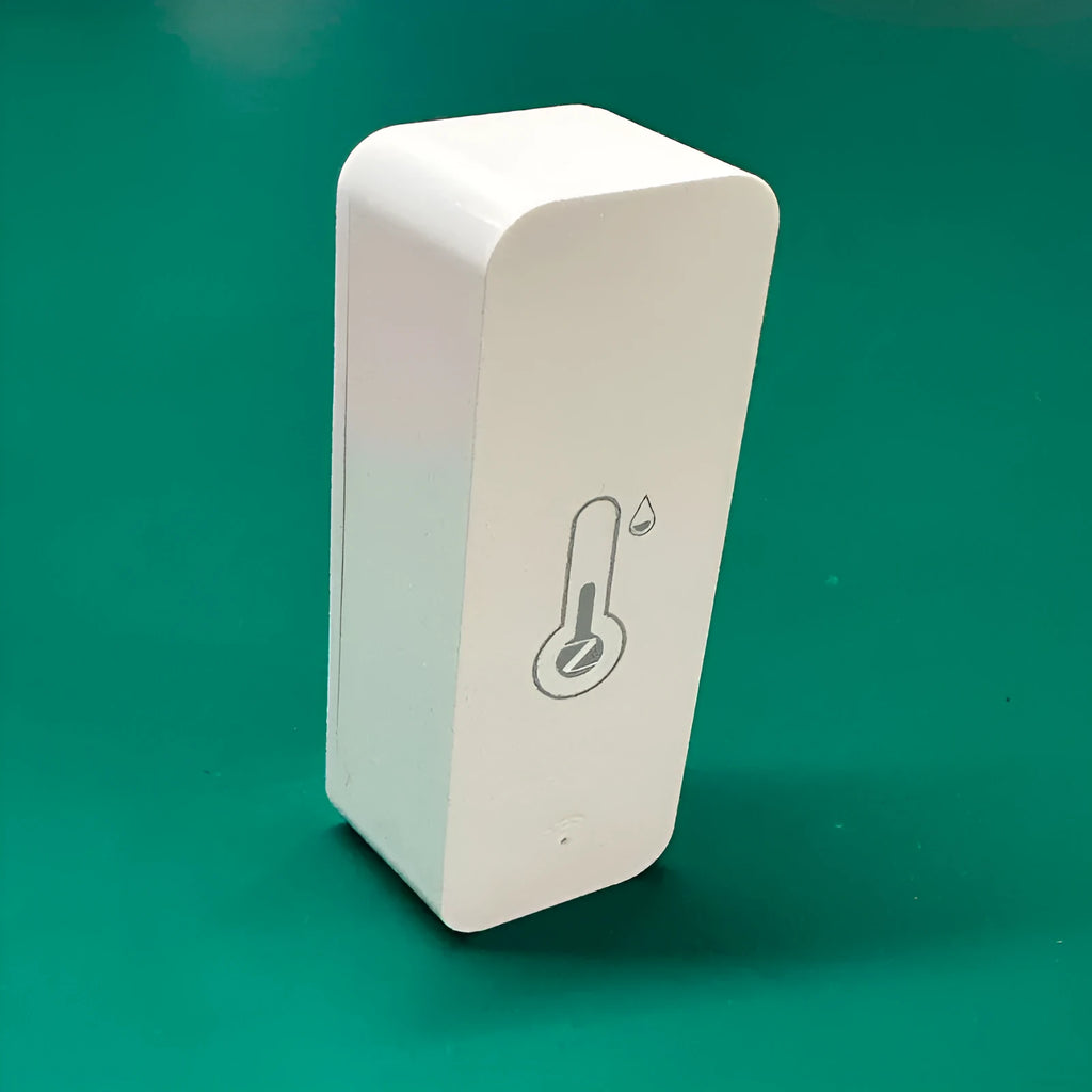 WiFi and Zigbee temperature humidity sensor with ABS plastic casing measuring 72mm