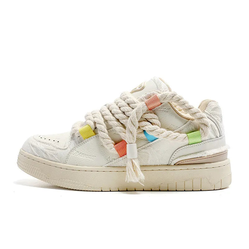 Creamy white retro skate shoes with old damage lace design and low-top platform construction
