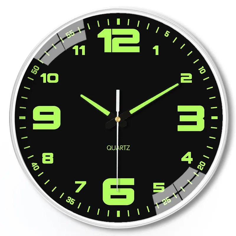 8 inch modern wall clock with luminous hands and black numerals on a light dial.