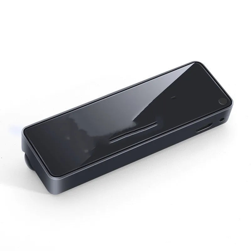 Black automobile air vent clip with LED light and aromatherapy diffuser for car odour removal.