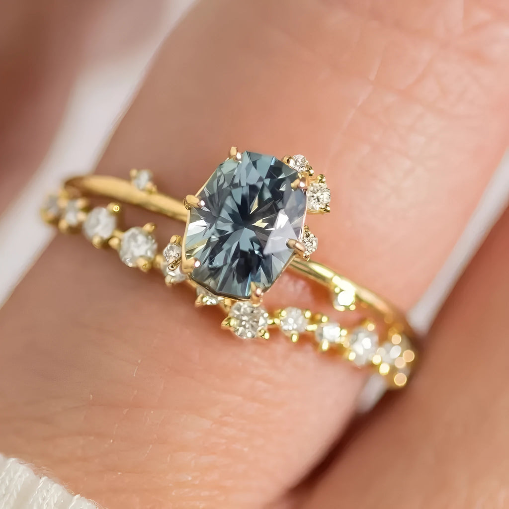 Gold plated women's ring with green zircon stone in flower shape setting, showing front and side views