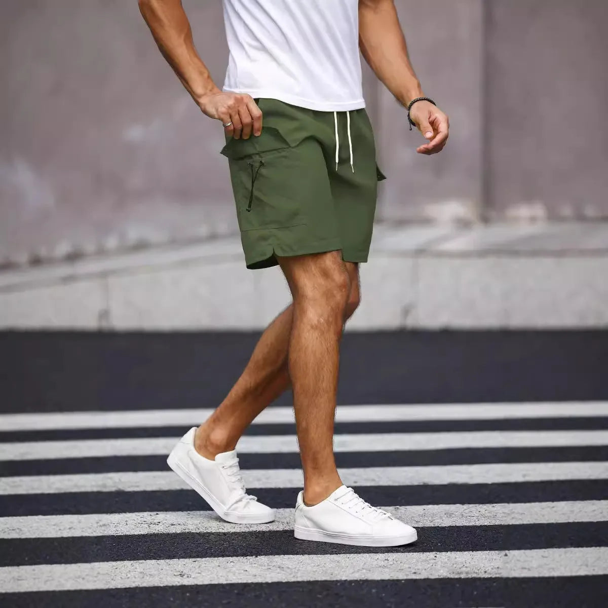 Men's loose fit workwear shorts in Cool Silk Cotton fabric showing fluorescent green and army green colour options