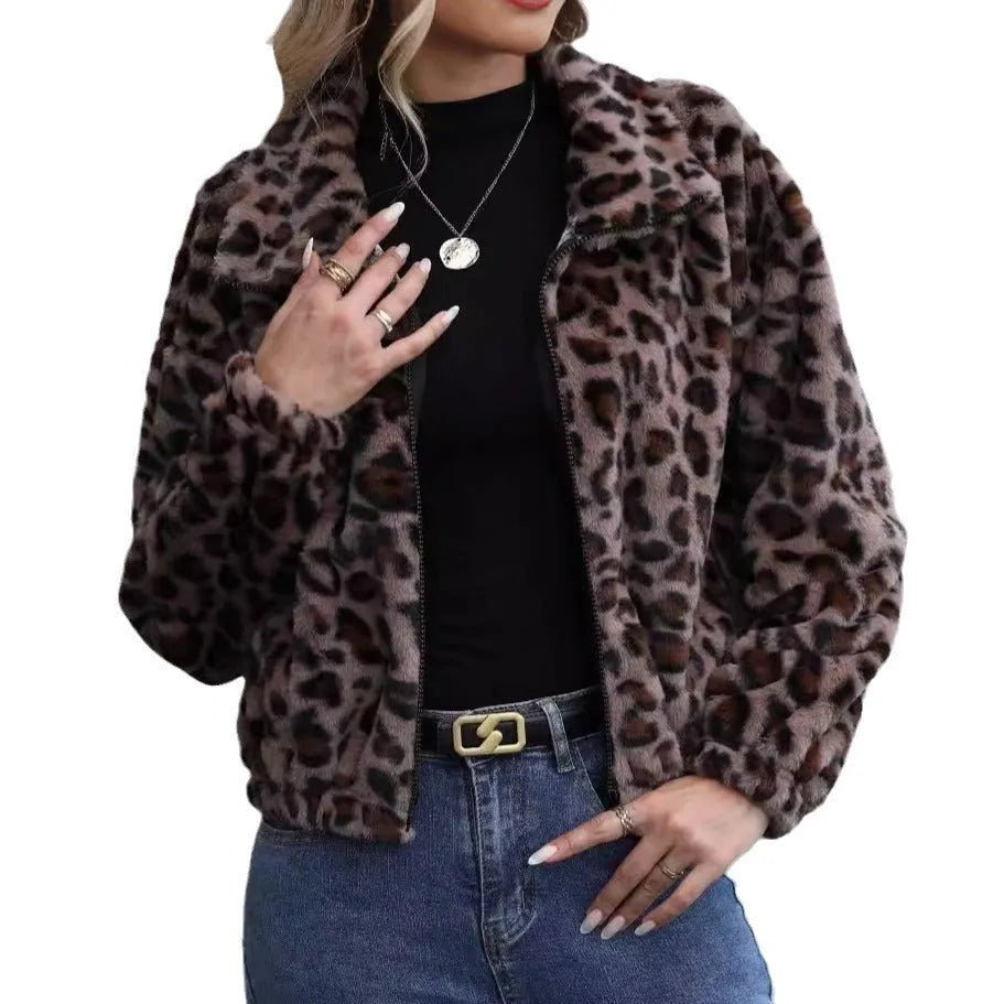 Women's loose leopard print plush coat with front zip and raglan sleeves on a hanger