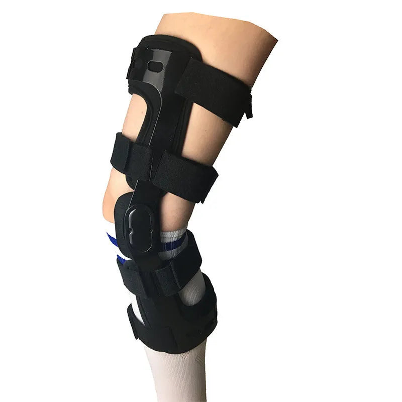 Black anterior ligament knee pad with plastic hinge components and sponge padding